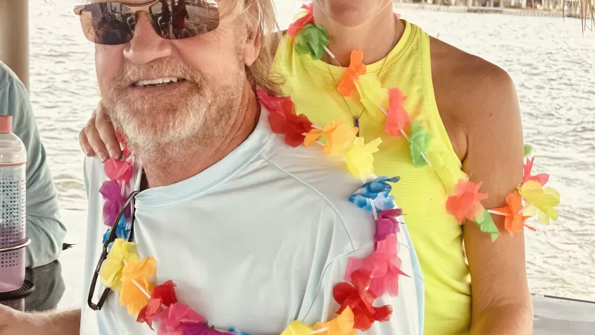 Couple having fun on a tiki cruise