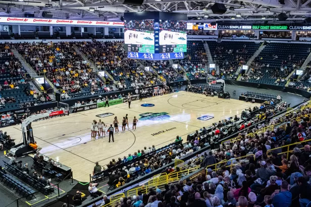 A photo of a basketball game in progress
