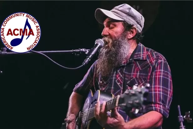 Musician Ben Presage performing with ACMA logo in corner
