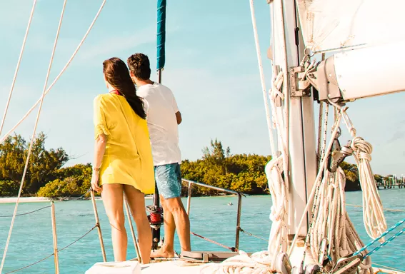 Couple standing on a boat