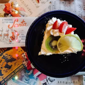 A holiday themed dessert with a note from Santa attached